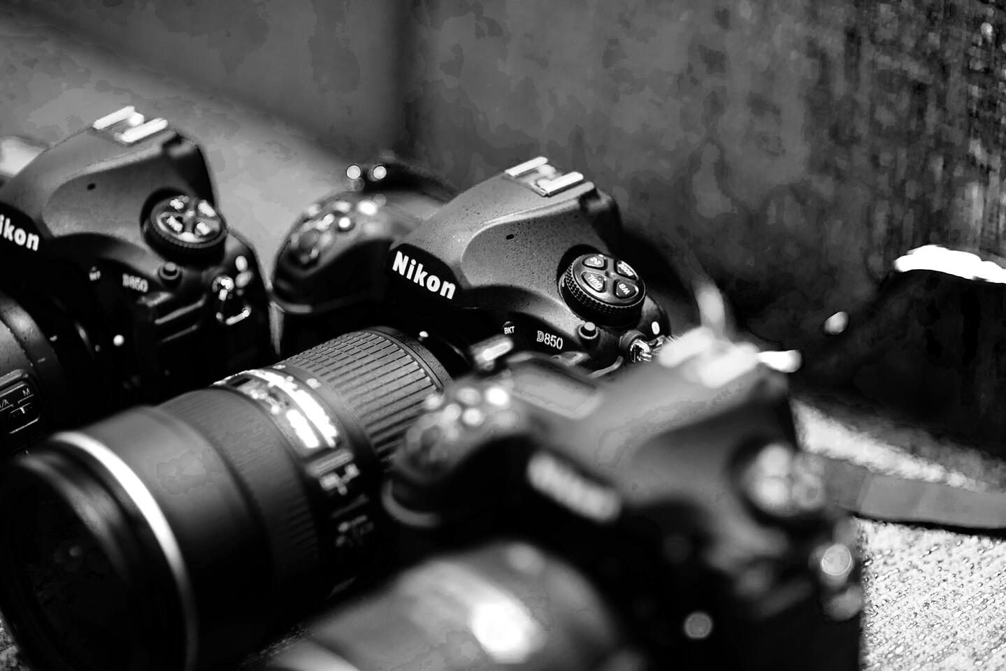 Close-up of professional Nikon camera gear, signaling high-end tools and readiness for precision event coverage.